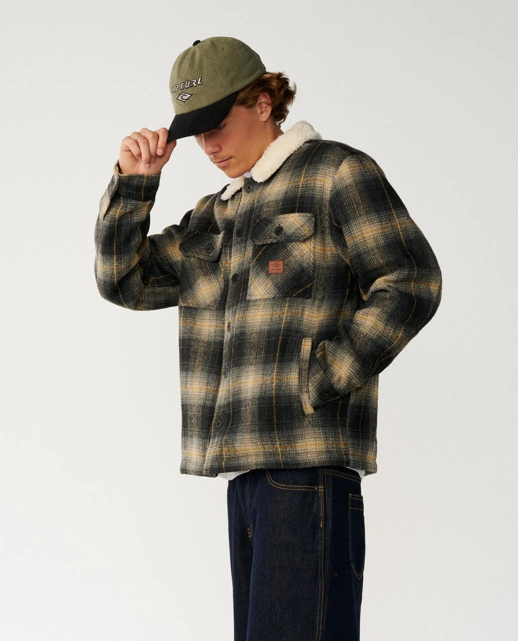 Plaid sherpa-collar snap jacket with chest pockets, dark olive plaid.