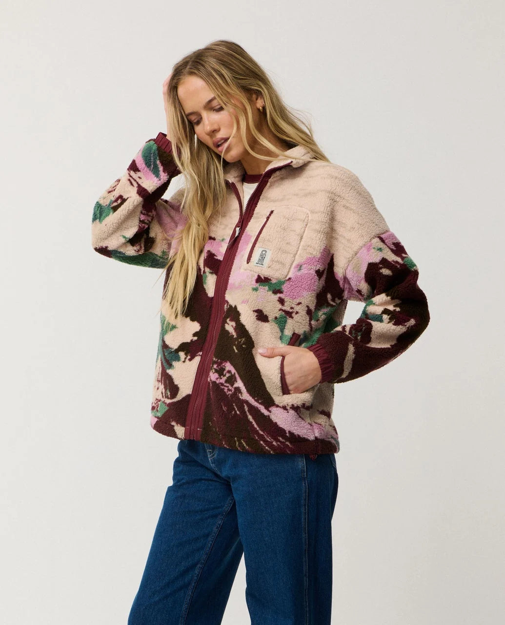 Polar fleece zip-through jacket with plum camo print, high collar and front zip