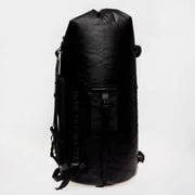 Black waterproof dry bag with roll-top closure and side carry straps