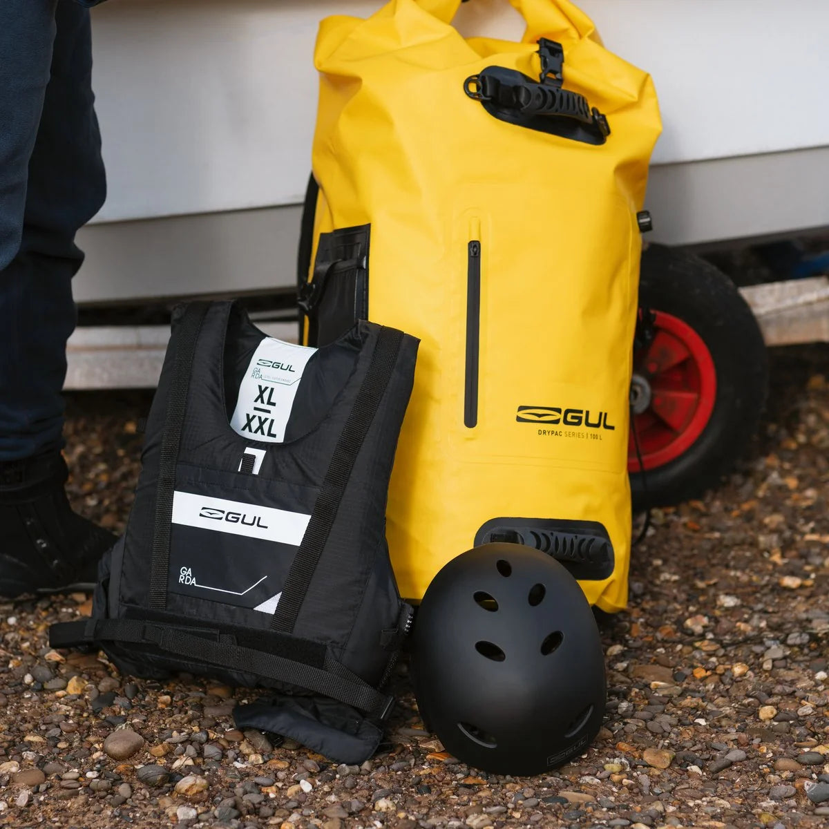 Yellow 100L waterproof roll-top drybag with front logo and black mounting straps