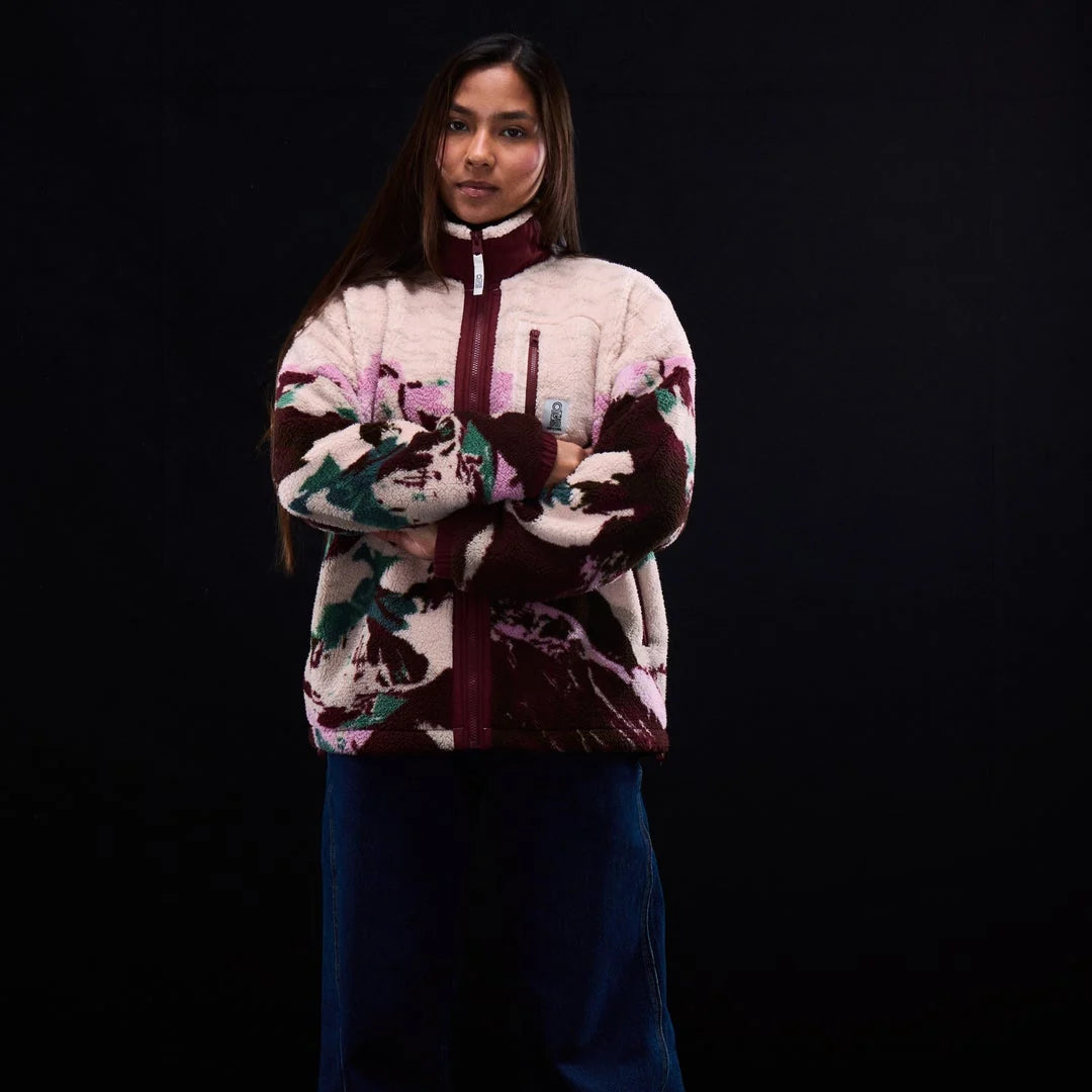 Polar fleece zip-through jacket front view with plum camo print and zipped chest pocket