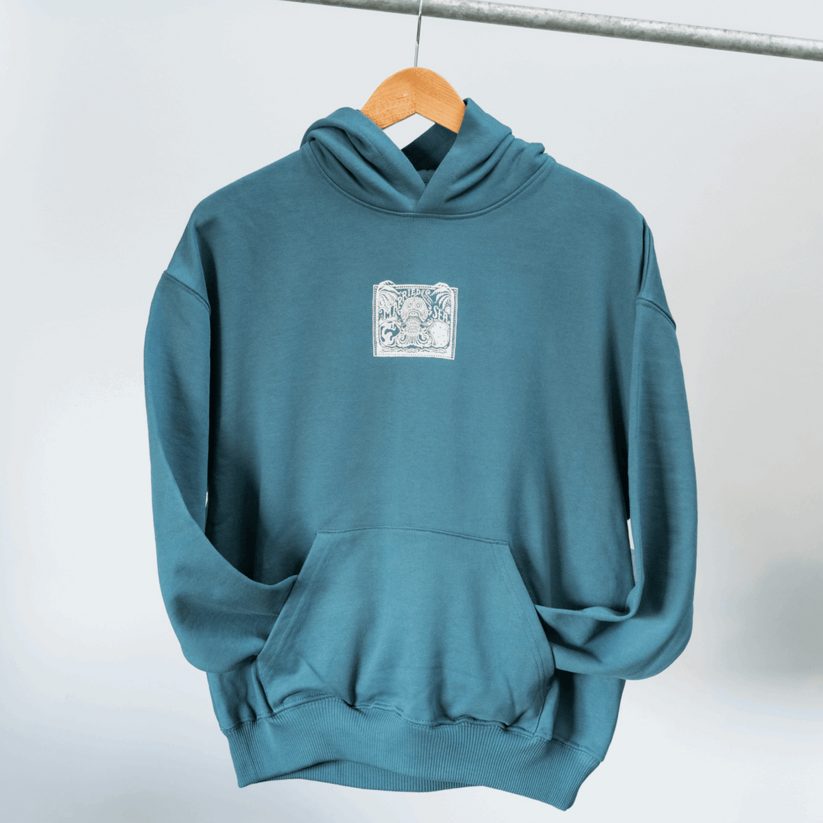 Teal hooded sweatshirt with front square monster graphic patch