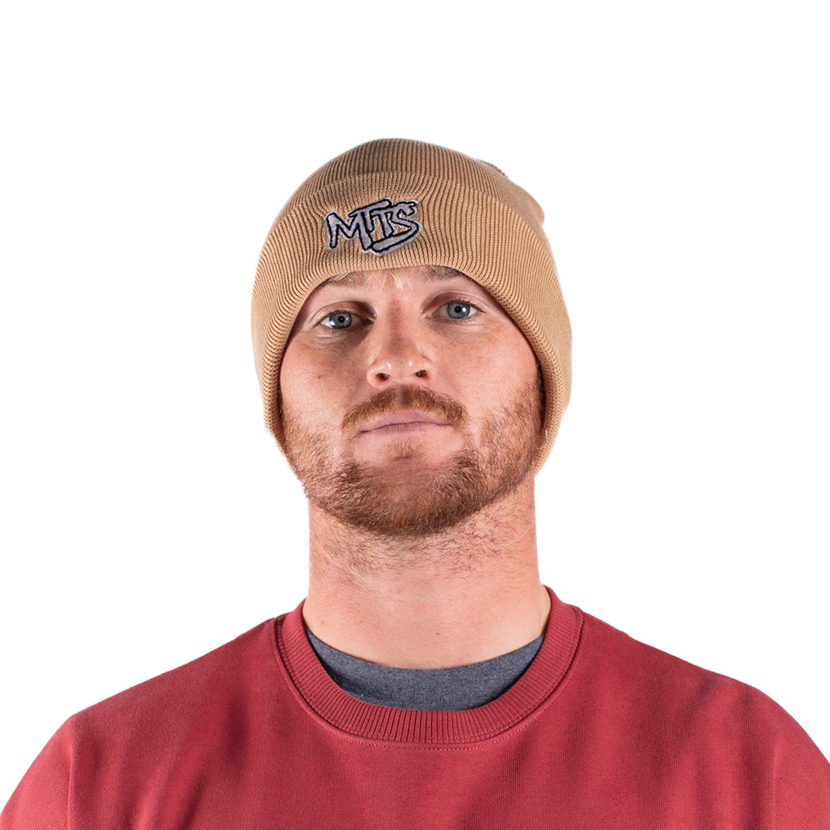 Latte ribbed beanie with MTS logo, worn with the cuff folded