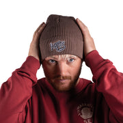 Mocha ribbed fisherman beanie with a folded cuff and embroidered logo