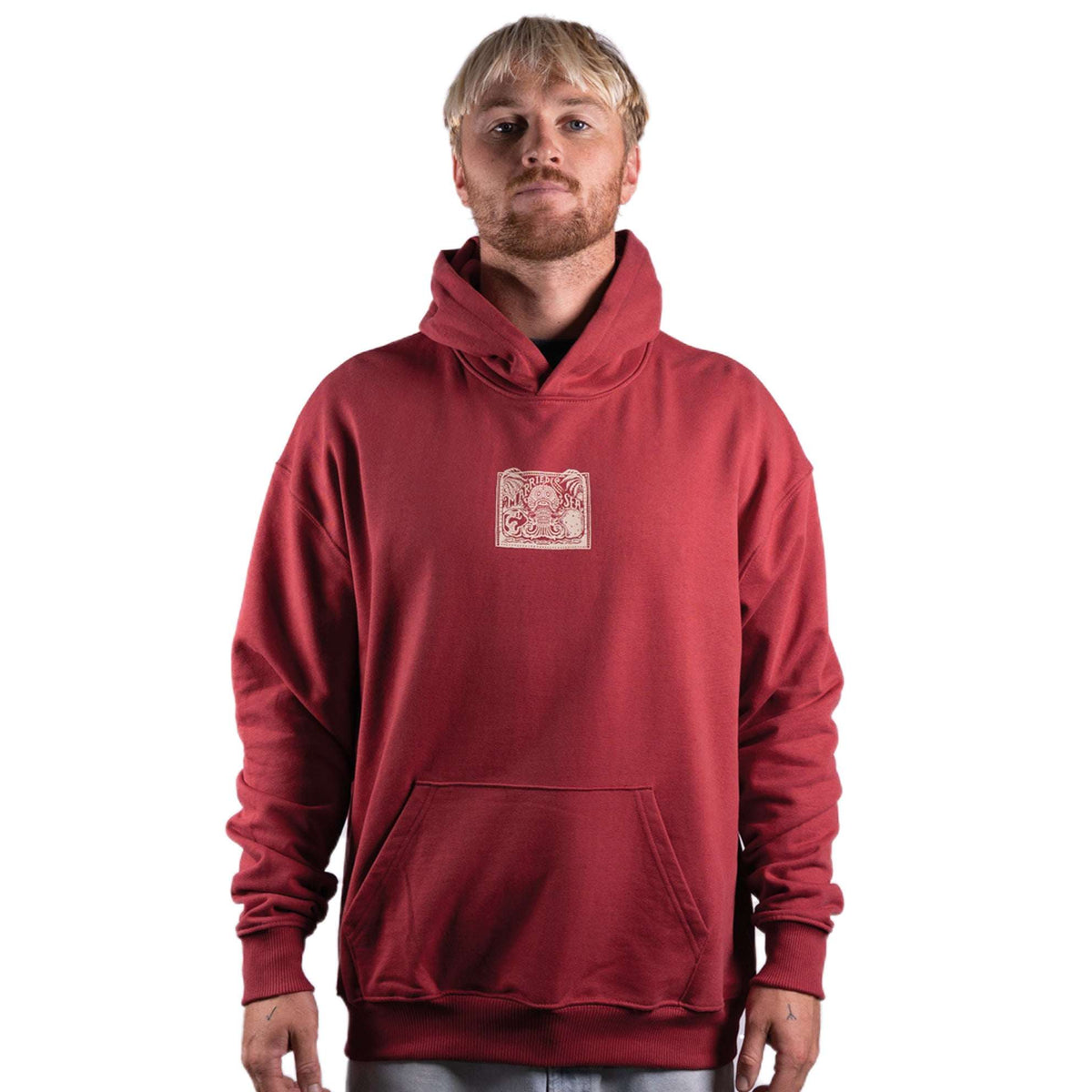 Burgundy pullover hoodie with hood and front pocket, small chest logo patch