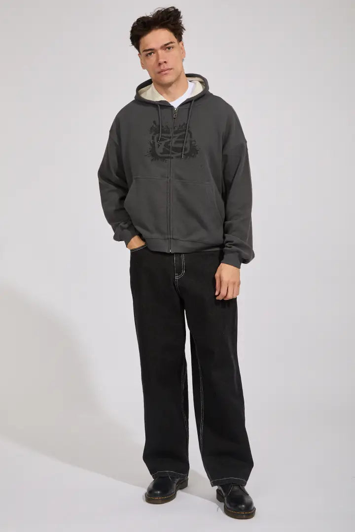 Steel gray zip-up hooded fleece on model, front zip and chest graphic